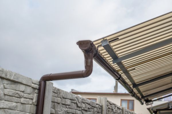 Plastic Downspout Installation in Advance